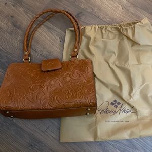 Patricia Nash tooled leather handbag.